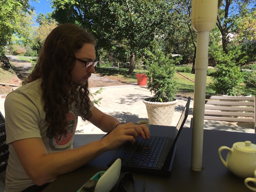 Avdi working on the café patio