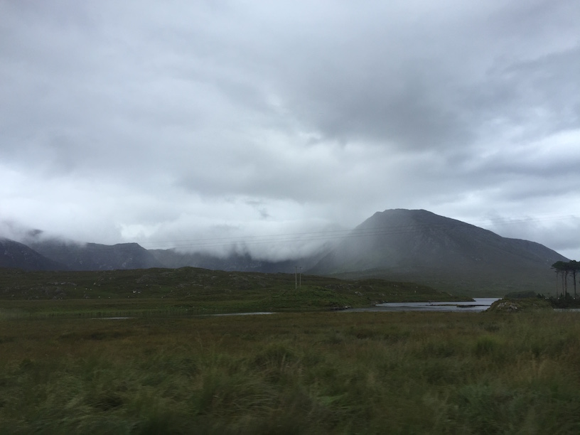 Clouds running over a mountain